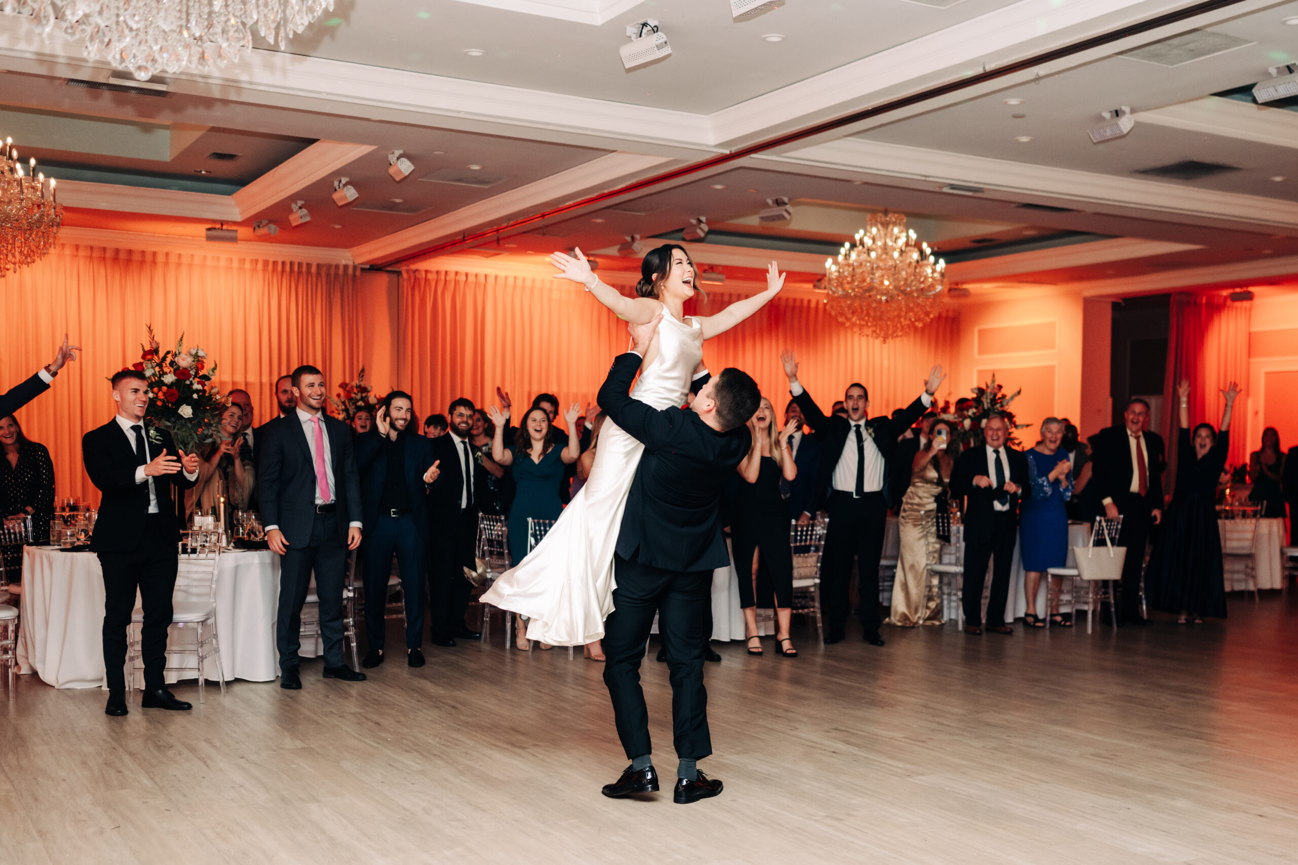 Bride and groom grand entrance to their reception at Benvenuto 